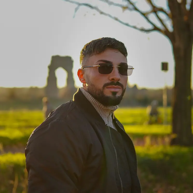 Man in tinted sunglasses outdoors